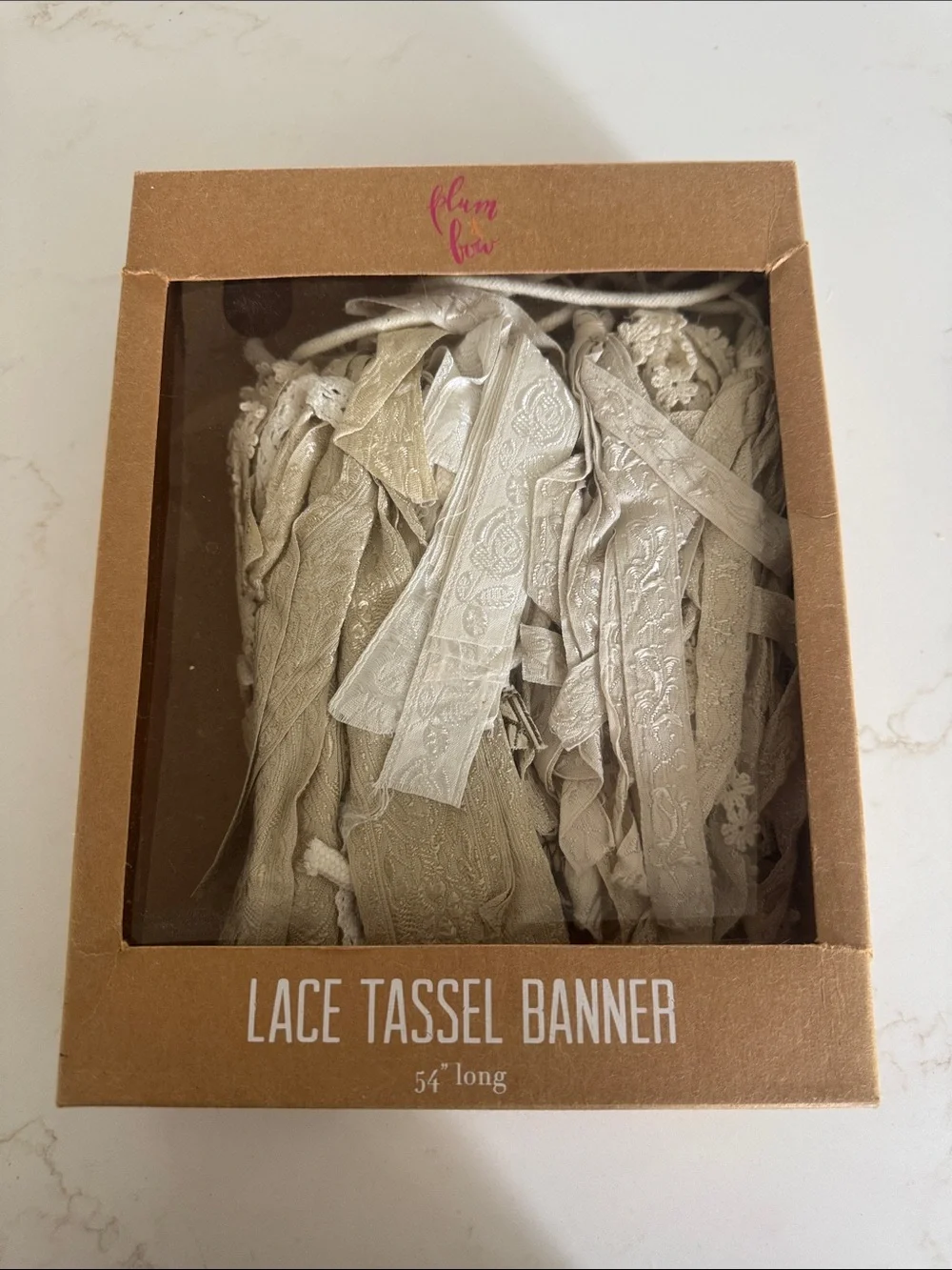 Urban Outfitters Lace Tassel Banner in Cream